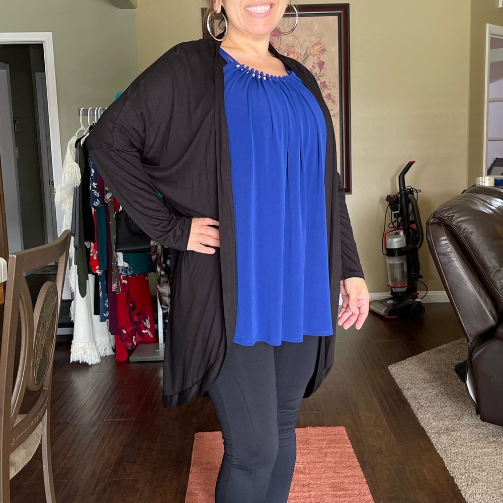 Black color Cardigan type Cover. Feels like a 2x, goes over anything,